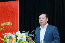 Phó Chủ tịch Hội đồng Lý luận Trung ương Phạm Văn Linh báo cáo chuyên đề tại hội nghị. (Ảnh: Phương Hoa/TTXVN) 