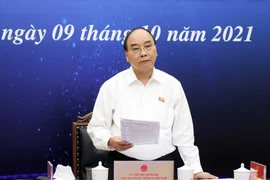 Chủ tịch nước Nguyễn Xuân Phúc phát biểu tại điểm cầu Hà Nội. (Ảnh: Thống Nhất/TTXVN) 