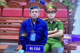 Bị cáo Ngô Văn Thụy tại phiên xét xử. (Ảnh: Lê Xuân/TTXVN) 