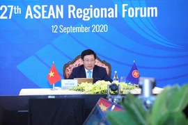 Phó Thủ tướng, Bộ trưởng Ngoại giao Phạm Bình Minh chủ trì Diễn đàn Khu vực ASEAN lần thứ 27. (Ảnh: Lâm Khánh/TTXVN)
