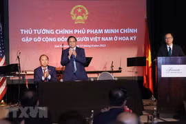 Thủ tướng Phạm Minh Chính gặp đại diện Cộng đồng Người Việt Nam tại Hoa Kỳ. (Ảnh: Dương Giang/TTXVN)