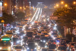 [Photo] Nhịp sống của người Hà Nội sau kỳ nghỉ Tết Nguyên đán