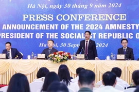 Ông Phạm Thanh Hà, Phó Chủ nhiệm Văn phòng Chủ tịch nước, điều hành cuộc họp báo. (Ảnh: Doãn Tấn/TTXVN)