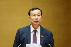 Chủ nhiệm Ủy ban Quốc phòng và An ninh của Quốc hội Lê Tấn Tới trình bày Báo cáo giải trình, tiếp thu, chỉnh lý dự thảo Luật Cảnh sát cơ động. (Ảnh: Phương Hoa/TTXVN) 