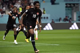 Tiền đạo Canada Alphonso Davies ăn mừng bàn thắng mở tỷ số cho đội nhà. (Ảnh: AFP/TTXVN) 