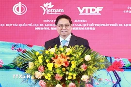 Thủ tướng Phạm Minh Chính phát biểu tại Chương trình giới thiệu Văn hoá và Du lịch Việt Nam tại thành phố Trùng Khánh. (Ảnh: Dương Giang/TTXVN)