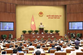 Ủy viên Ủy ban Thường vụ Quốc hội, Chủ nhiệm Ủy ban Quốc phòng và An ninh của Quốc hội Lê Tấn Tới trình bày Báo cáo giải trình, tiếp thu, chỉnh lý dự thảo Luật Căn cước. (Ảnh: Doãn Tấn/TTXVN) 