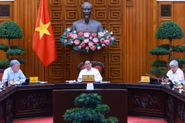 Chiều 1/10/2024, tại Hà Nội, Thủ tướng Phạm Minh Chính chủ trì cuộc làm việc giữa Thường trực Chính phủ với Uỷ ban Trung ương Mặt trận Tổ quốc Việt Nam về xoá nhà tạm, nhà dột nát cho các hộ nghèo, hộ cận nghèo trên địa bàn cả nước. Ảnh: Dương Giang-TTXVN