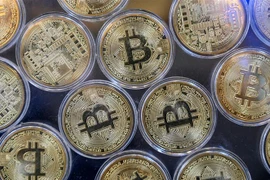 Đồng tiền kỹ thuật số Bitcoin. (Ảnh: AFP/TTXVN) 