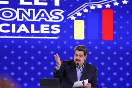 Nhà lãnh đạo Venezuela Nicolas Maduro cũng tham gia cuộc tuần hành. (Ảnh: AFP/TTXVN) 