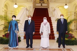 [Photo] Quốc yến chào mừng Chủ tịch nước Nguyễn Xuân Phúc và Phu nhân