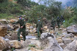 Cán bộ, chiến sỹ Đồn Biên phòng Si Ma Cai tuần tra kiểm soát khu vực biên giới. (Ảnh: Dương Giang/TTXVN) 