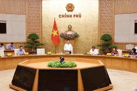 Phó Thủ tướng Lê Thành Long, Chủ tịch Ủy ban Quốc gia về người cao tuổi Việt Nam phát biểu. (Ảnh: Doãn Tấn/TTXVN)