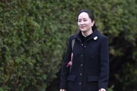 CFO Tập đoàn Huawei của Trung Quốc, Mạnh Vãn Châu, tới Tòa án Tối cao ở British Columbia, Canada để bắt đầu phiên tòa xem xét việc dẫn độ bà về Mỹ, ngày 20/1/2020. (Nguồn: AFP/TTXVN) 