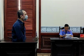 Bị cáo Nguyễn Tuấn Thanh tại phiên tòa. (Ảnh: TTXVN phát)