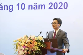 Phó Thủ tướng Vũ Đức Đam phát biểu tại hội nghị. (Ảnh: Hoàng Hiếu/TTXVN) 