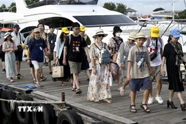 (Tư liệu) Khách du lịch tại Bali, Indonesia, ngày 25/1/2023. Ảnh: AFP/ TTXVN 