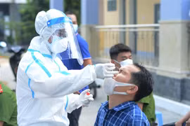 Xét nghiệm COVID-19. (Ảnh: Văn Dũng/TTXVN) 