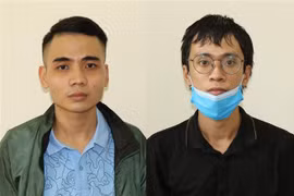 Hai đối tượng Lương Minh Ngọc và Nguyễn Thái Quý. (Ảnh: TTXVN phát) 