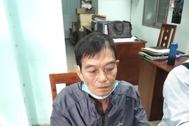 Đối tượng Đặng Huy Tạo đã bị công an bắt giữ. (Nguồn: TTXVN phát) 