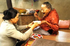 [Photo] Người cao tuổi là trụ cột của gia đình và xã hội Việt Nam