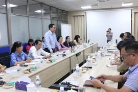 Quang cảnh buổi làm việc của Bộ Lao động, Thương binh và Xã hội với Công ty trách nhiệm hữu hạn PouYuen Việt Nam. (Ảnh: Thanh Vũ/TTXVN)