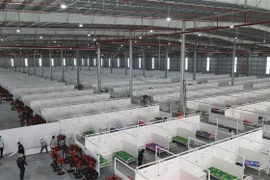 Giường bệnh chuẩn bị thu dung điều trị bệnh nhân COVID-19 tại Bệnh viện dã chiến Thới Hòa ( thị xã Bến Cát, tỉnh Bình Dương). (Ảnh: TTXVN) 