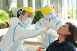 Xét nghiệm COVID-19. (Ảnh: Văn Dũng/TTXVN) 