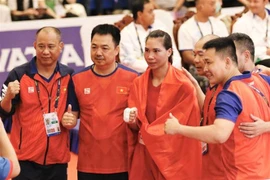 Vận động viên Hà Thị Linh giành huy chương Vàng môn Boxing ở hạng cân 60-63kg. (Ảnh: TTXVN)