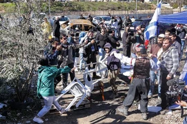 Xung đột giữa người Palestine và người định cư Israel ở khu vực Sheikh Jarrah thuộc Đông Jerusalem ngày 13/2/2022. (Ảnh: AFP/TTXVN) 