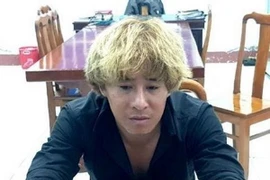 Đối tượng Lê Công Minh tại cơ quan chức năng. (Nguồn: TTXVN phát) 