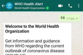 Ứng dụng WhatsApp WHO Health Alert truy vấn thông tin chính thức về COVID-19 qua tổng đài +41798931892 do WHO quản lý. (Ảnh: Đình Lượng/TTXVN) 