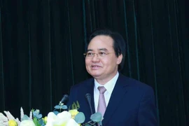 Ông Phùng Xuân Nhạ, Phó Trưởng Ban Tuyên giáo Trung ương phát biểu tại hội nghị. (Ảnh: Phương Hoa/TTXVN)