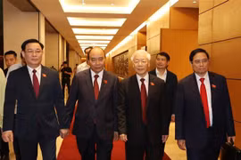 Tổng Bí thư Nguyễn Phú Trọng cùng Chủ tịch nước Nguyễn Xuân Phúc, Thủ tướng Phạm Minh Chính và Chủ tịch Quốc hội Vương Đình Huệ dự bế mạc Kỳ họp thứ 11, Quốc hội khoá XIV. (Ảnh: Trí Dũng/TTXVN)