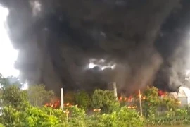 Vụ cháy thiêu rụi xưởng may có diện tích 1.900m2. (Nguồn: CTV/Vietnam+)