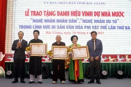 Lễ trao tặng danh hiệu vinh dự Nhà nước Nghệ nhân Nhân dân, Nghệ nhân Ưu tú trong lĩnh vực Di sản Văn hóa Phi vật thể. (Nguồn: TTXVN)