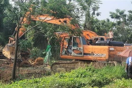 Cưỡng chế, giải phóng mặt bằng Dự án Khu Đô thị Mới Nam Vĩnh Yên. (Ảnh: Nguyễn Trọng Lịch/TTXVN)