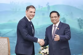 Thủ tướng Phạm Minh Chính tiếp Bộ trưởng Bộ Tư pháp Hungary Tuzson Bence. (Ảnh: Dương Giang/TTXVN)