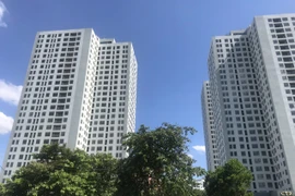 Chính sách định danh số nhà được cho là sẽ tác động tích cực đến thị trường bất động sản. (Nguồn: Vietnam+)