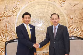 Trưởng Ban Đối ngoại Trung ương Lê Hoài Trung tiếp Phó Thủ tướng, Bộ trưởng Ngoại giao Thái Lan Parnpree Bahiddha-Nukara. (Ảnh: Phương Hoa/TTXVN)