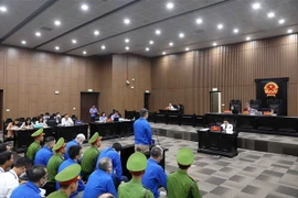 Quang cảnh phiên xét xử. (Ảnh: Phạm Kiên/TTXVN)