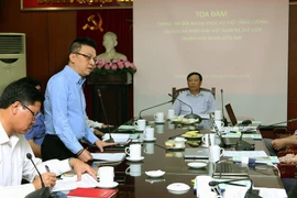 Phó Tổng Giám đốc Thông tấn xã Việt Nam Lê Quốc Minh tham luận tại buổi toạ đàm. (Ảnh: Nguyễn Dân/TTXVN)