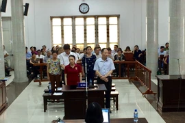 Các bị cáo tại phiên tòa. (Ảnh: Nguyễn Dũng/Vietnam+)