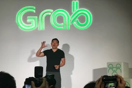 CEO Tập đoàn kiêm đồng sáng lập Grab Anthony Tan công bố chiến lược nền tảng mở mới GrabPlatform. (Ảnh: Mỹ Bình/Vietnam+)