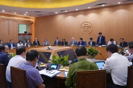 Quang cảnh buổi làm việc. (Ảnh: Nguyễn Văn Cảnh/TTXVN)