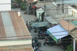 Công an phong tỏa hiện trường vụ án mạng (Ảnh: Thành Chung/TTXVN)