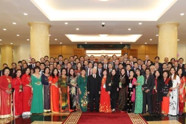 Tổng Bí thư Nguyễn Phú Trọng gặp mặt thân mật kiều bào tiêu biểu, ngày 7/2/2018. (Ảnh: Trí Dũng/TTXVN)