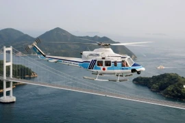 Ảnh tư liệu: Máy bay trực thăng cứu hộ Bell 412EP của Nhật Bản. (Nguồn: AFP/TTXVN)