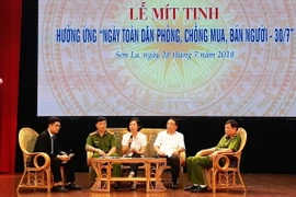 Các đại biểu đối thoại về công tác phòng, chống mua bán người. (Ảnh: Nguyễn Chiến/TTXVN)