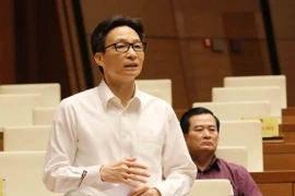 Phó Thủ tướng Vũ Đức Đam giải trình, làm rõ vấn đề Đại biểu Quốc hội nêu. (Ảnh: Phương Hoa/TTXVN)